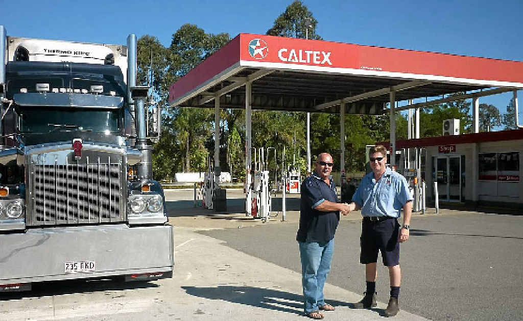 WINNERS: Nick Brook shakes hands with Gold Nugget manager Ken Lavender after they both won $500. WINNERS: Nick Brook shakes hands with Gold Nugget manager Ken Lavender after they both won $500.